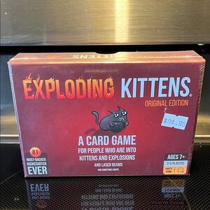 New in Package (shrink wrap and all) Exploding Kittens